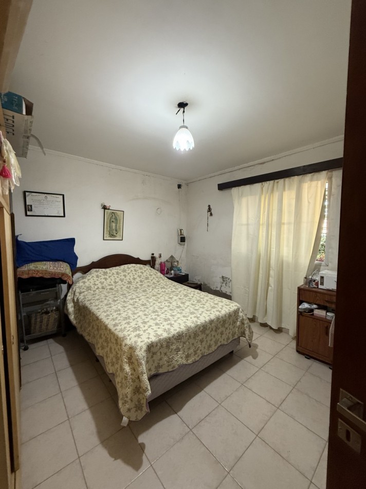 CASA CON AMPLIO TERRENO Y COCHERA DOBLE APTA A CREDITO HIPOTECARIO